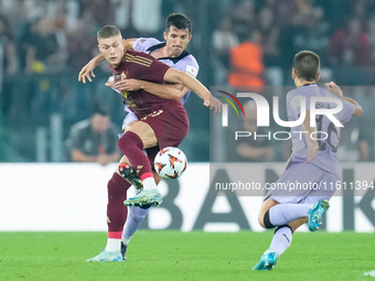 Artem Dovbyk of AS Roma and Daniel Vivian of Athletic Club compete for the ball during the UEFA Europa League 2024/25 League Phase MD1 match...