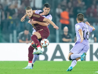 Artem Dovbyk of AS Roma and Daniel Vivian of Athletic Club compete for the ball during the UEFA Europa League 2024/25 League Phase MD1 match...