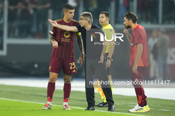 Ivan Juric head coach of Roma gives instructions to Gianluca Mancini centre-back of Roma and Italy during the UEFA Europa League 2024/25 Lea...