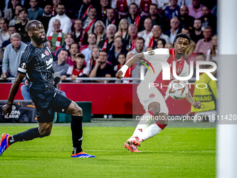 Besiktas JK midfielder Jean Onana and AFC Ajax Amsterdam defender Jorrel Hato during the match between Ajax and Besiktas at the Johan Cruijf...