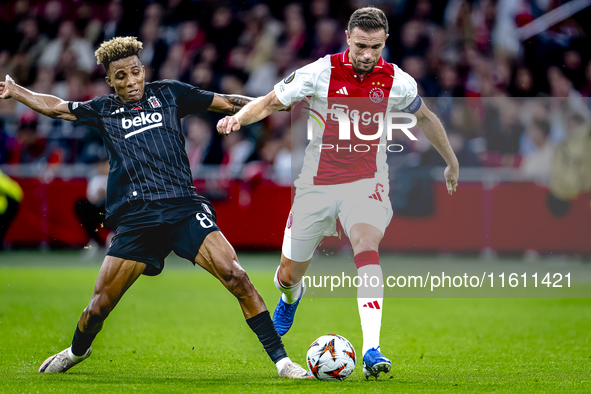 Besiktas JK midfielder Gedson Fernandes and AFC Ajax Amsterdam midfielder Jordan Henderson during the match between Ajax and Besiktas at the...