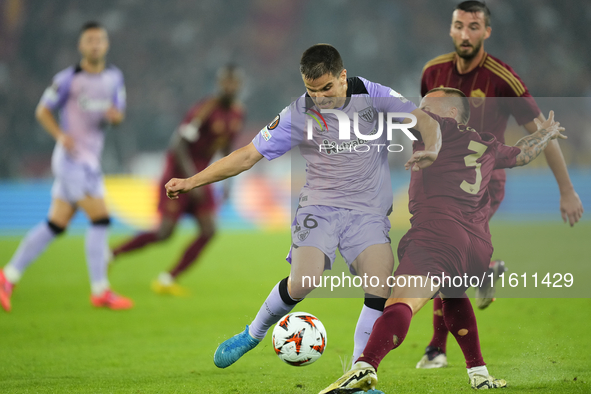 Inigo Ruiz de Galarreta central midfield of Athletic Club and Spainshooting to goal nAngelino left-back of Roma and Spain compete for the ba...