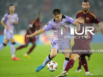 Inigo Ruiz de Galarreta central midfield of Athletic Club and Spainshooting to goal nAngelino left-back of Roma and Spain compete for the ba...