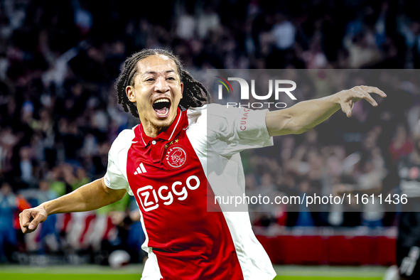 AFC Ajax Amsterdam midfielder Kian Fitz-Jim scores the 1-0 goal and celebrates during the match between Ajax and Besiktas at the Johan Cruij...