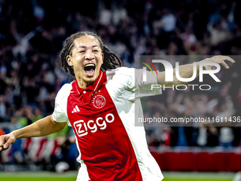 AFC Ajax Amsterdam midfielder Kian Fitz-Jim scores the 1-0 goal and celebrates during the match between Ajax and Besiktas at the Johan Cruij...