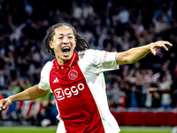 AFC Ajax Amsterdam midfielder Kian Fitz-Jim scores the 1-0 goal and celebrates during the match between Ajax and Besiktas at the Johan Cruij...