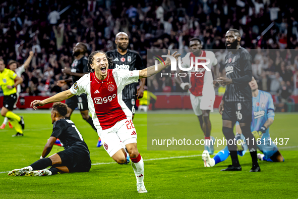 AFC Ajax Amsterdam midfielder Kian Fitz-Jim scores the 1-0 goal and celebrates during the match between Ajax and Besiktas at the Johan Cruij...