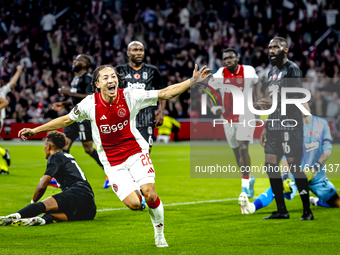 AFC Ajax Amsterdam midfielder Kian Fitz-Jim scores the 1-0 goal and celebrates during the match between Ajax and Besiktas at the Johan Cruij...