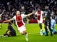 AFC Ajax Amsterdam midfielder Kian Fitz-Jim scores the 1-0 goal and celebrates during the match between Ajax and Besiktas at the Johan Cruij...