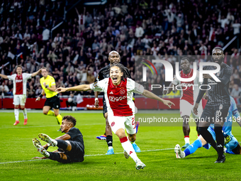 AFC Ajax Amsterdam midfielder Kian Fitz-Jim scores the 1-0 goal and celebrates during the match between Ajax and Besiktas at the Johan Cruij...