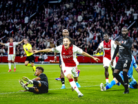 AFC Ajax Amsterdam midfielder Kian Fitz-Jim scores the 1-0 goal and celebrates during the match between Ajax and Besiktas at the Johan Cruij...