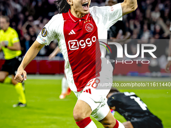 AFC Ajax Amsterdam midfielder Kian Fitz-Jim scores the 1-0 goal and celebrates during the match between Ajax and Besiktas at the Johan Cruij...