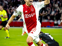 AFC Ajax Amsterdam midfielder Kian Fitz-Jim scores the 1-0 goal and celebrates during the match between Ajax and Besiktas at the Johan Cruij...