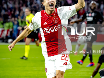 AFC Ajax Amsterdam midfielder Kian Fitz-Jim scores the 1-0 goal and celebrates during the match between Ajax and Besiktas at the Johan Cruij...