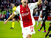 AFC Ajax Amsterdam midfielder Kian Fitz-Jim scores the 1-0 goal and celebrates during the match between Ajax and Besiktas at the Johan Cruij...