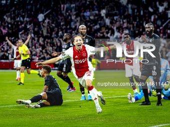 AFC Ajax Amsterdam midfielder Kian Fitz-Jim scores the 1-0 goal and celebrates during the match between Ajax and Besiktas at the Johan Cruij...