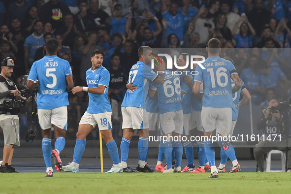 Cyril Ngonge of SSC Napoli celebrates with team mates after scoring during the Coppa Italia match between SSC Napoli and Palermo FC at Stadi...