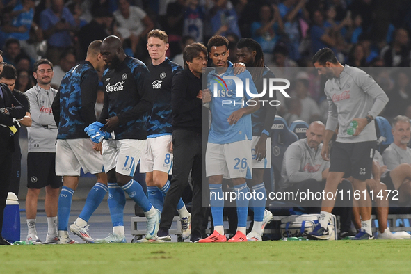 Antonio Conte Head Coach of SSC Napoli and Cyril Ngonge during the Coppa Italia match between SSC Napoli and Palermo FC at Stadio Diego Arma...