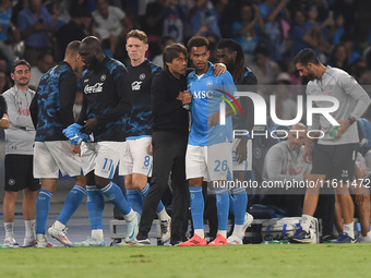 Antonio Conte Head Coach of SSC Napoli and Cyril Ngonge during the Coppa Italia match between SSC Napoli and Palermo FC at Stadio Diego Arma...