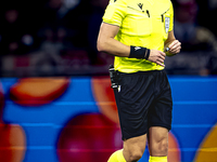 Referee John Brooks officiates the match between Ajax and Besiktas at the Johan Cruijff ArenA for the UEFA Europa League - League phase - Ma...