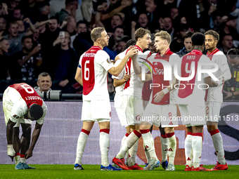 AFC Ajax Amsterdam midfielder Kenneth Taylor scores the 3-0 goal and celebrates during the match between Ajax and Besiktas at the Johan Crui...