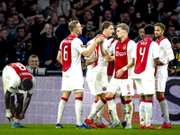 AFC Ajax Amsterdam midfielder Kenneth Taylor scores the 3-0 goal and celebrates during the match between Ajax and Besiktas at the Johan Crui...