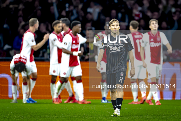 Besiktas JK defender Jonas Svensson appears dejected during the match between Ajax and Besiktas at the Johan Cruijff ArenA for the UEFA Euro...