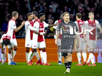 Besiktas JK defender Jonas Svensson appears dejected during the match between Ajax and Besiktas at the Johan Cruijff ArenA for the UEFA Euro...