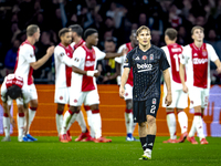 Besiktas JK defender Jonas Svensson appears dejected during the match between Ajax and Besiktas at the Johan Cruijff ArenA for the UEFA Euro...