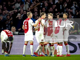 AFC Ajax Amsterdam midfielder Kenneth Taylor scores the 3-0 goal and celebrates during the match between Ajax and Besiktas at the Johan Crui...