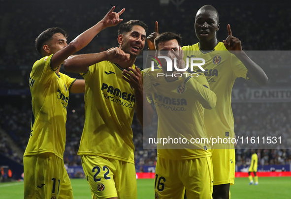 Ilias Akhomach, Alex Baena, Thierno Barry, and Ayoze Perez celebrate a goal during the match between RCD Espanyol and Villarreal CF, corresp...