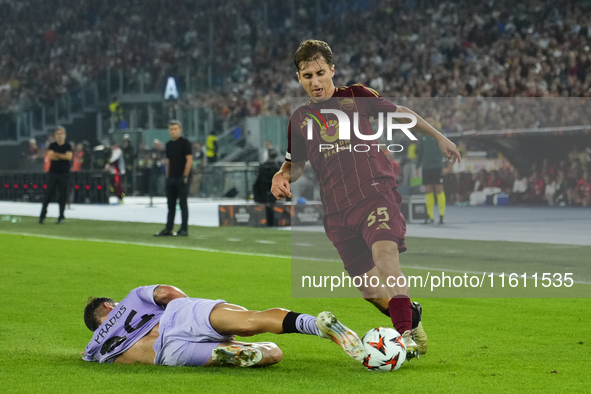 Tommaso Baldanzi attacking midfield of Roma and Italy and Benat Prados central midfield of Athletic Club and Spain compete for the ball duri...