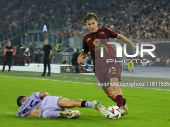 Tommaso Baldanzi attacking midfield of Roma and Italy and Benat Prados central midfield of Athletic Club and Spain compete for the ball duri...