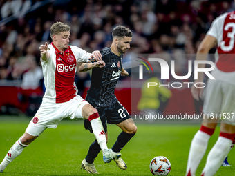 AFC Ajax Amsterdam midfielder Kenneth Taylor and Besiktas JK forward Rafa Silva play during the match Ajax vs. Besiktas at the Johan Cruijff...