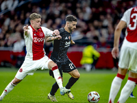 AFC Ajax Amsterdam midfielder Kenneth Taylor and Besiktas JK forward Rafa Silva play during the match Ajax vs. Besiktas at the Johan Cruijff...