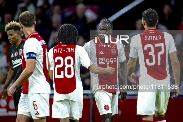 AFC Ajax Amsterdam midfielder Jordan Henderson and AFC Ajax Amsterdam forward Bertrand Traore have a discussion during the match Ajax vs. Be...