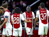 AFC Ajax Amsterdam midfielder Jordan Henderson and AFC Ajax Amsterdam forward Bertrand Traore have a discussion during the match Ajax vs. Be...