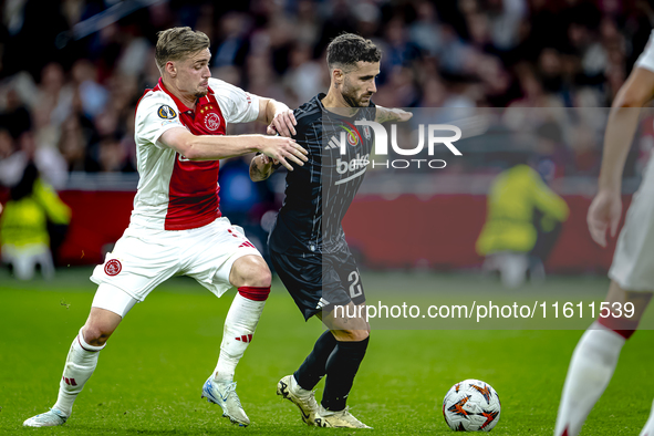 AFC Ajax Amsterdam midfielder Kenneth Taylor and Besiktas JK forward Rafa Silva play during the match Ajax vs. Besiktas at the Johan Cruijff...