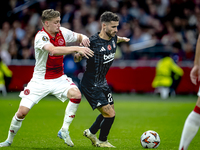 AFC Ajax Amsterdam midfielder Kenneth Taylor and Besiktas JK forward Rafa Silva play during the match Ajax vs. Besiktas at the Johan Cruijff...