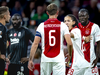 AFC Ajax Amsterdam midfielder Jordan Henderson and AFC Ajax Amsterdam forward Bertrand Traore have a discussion during the match Ajax vs. Be...