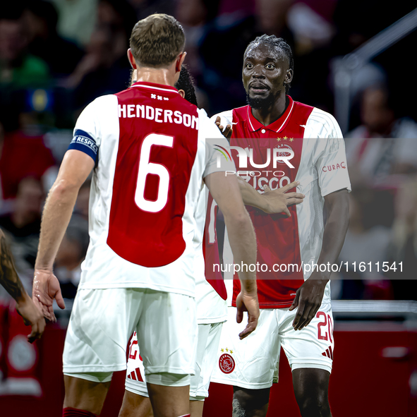 AFC Ajax Amsterdam midfielder Jordan Henderson and AFC Ajax Amsterdam forward Bertrand Traore have a discussion during the match Ajax vs. Be...