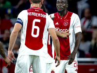 AFC Ajax Amsterdam midfielder Jordan Henderson and AFC Ajax Amsterdam forward Bertrand Traore have a discussion during the match Ajax vs. Be...