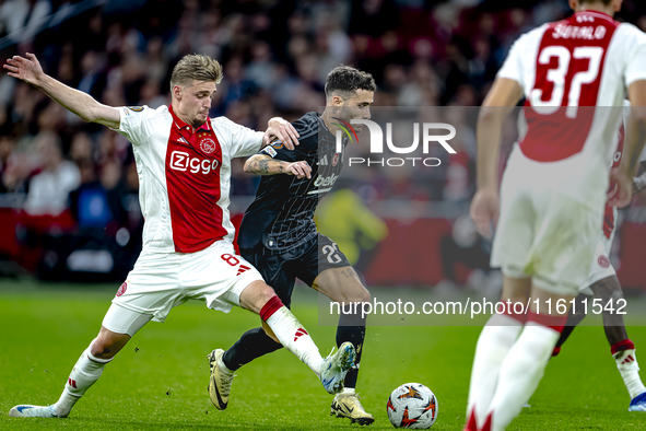 AFC Ajax Amsterdam midfielder Kenneth Taylor and Besiktas JK forward Rafa Silva play during the match Ajax vs. Besiktas at the Johan Cruijff...