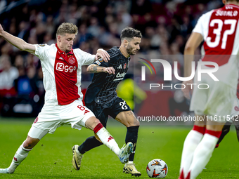 AFC Ajax Amsterdam midfielder Kenneth Taylor and Besiktas JK forward Rafa Silva play during the match Ajax vs. Besiktas at the Johan Cruijff...