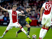 AFC Ajax Amsterdam midfielder Kenneth Taylor and Besiktas JK forward Rafa Silva play during the match Ajax vs. Besiktas at the Johan Cruijff...