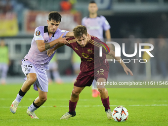 Tommaso Baldanzi attacking midfield of Roma and Italy and Benat Prados central midfield of Athletic Club and Spain compete for the ball duri...