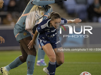 Khadija Shaw #21 of Manchester City W.F.C. challenges the opponent during the UEFA Women's Champions League Second Round 2nd Leg match betwe...