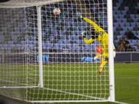 Chiamaka Nnadozie #16 (GK) of Paris FC makes a save during the UEFA Women's Champions League Second Round 2nd Leg match between Manchester C...