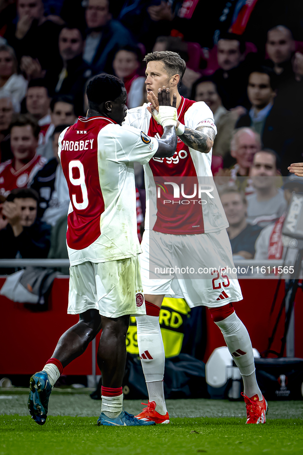 AFC Ajax Amsterdam forward Wout Weghorst replaces AFC Ajax Amsterdam forward Brian Brobbey during the match between Ajax and Besiktas at the...