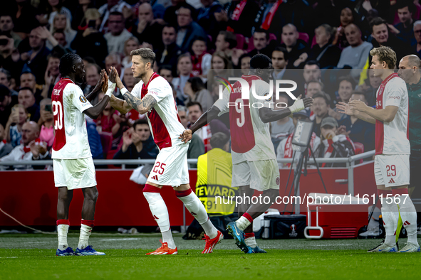 AFC Ajax Amsterdam forward Wout Weghorst replaces AFC Ajax Amsterdam forward Brian Brobbey during the match between Ajax and Besiktas at the...